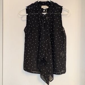 Ruffle Front Sleeveless Polka Dot Blouse